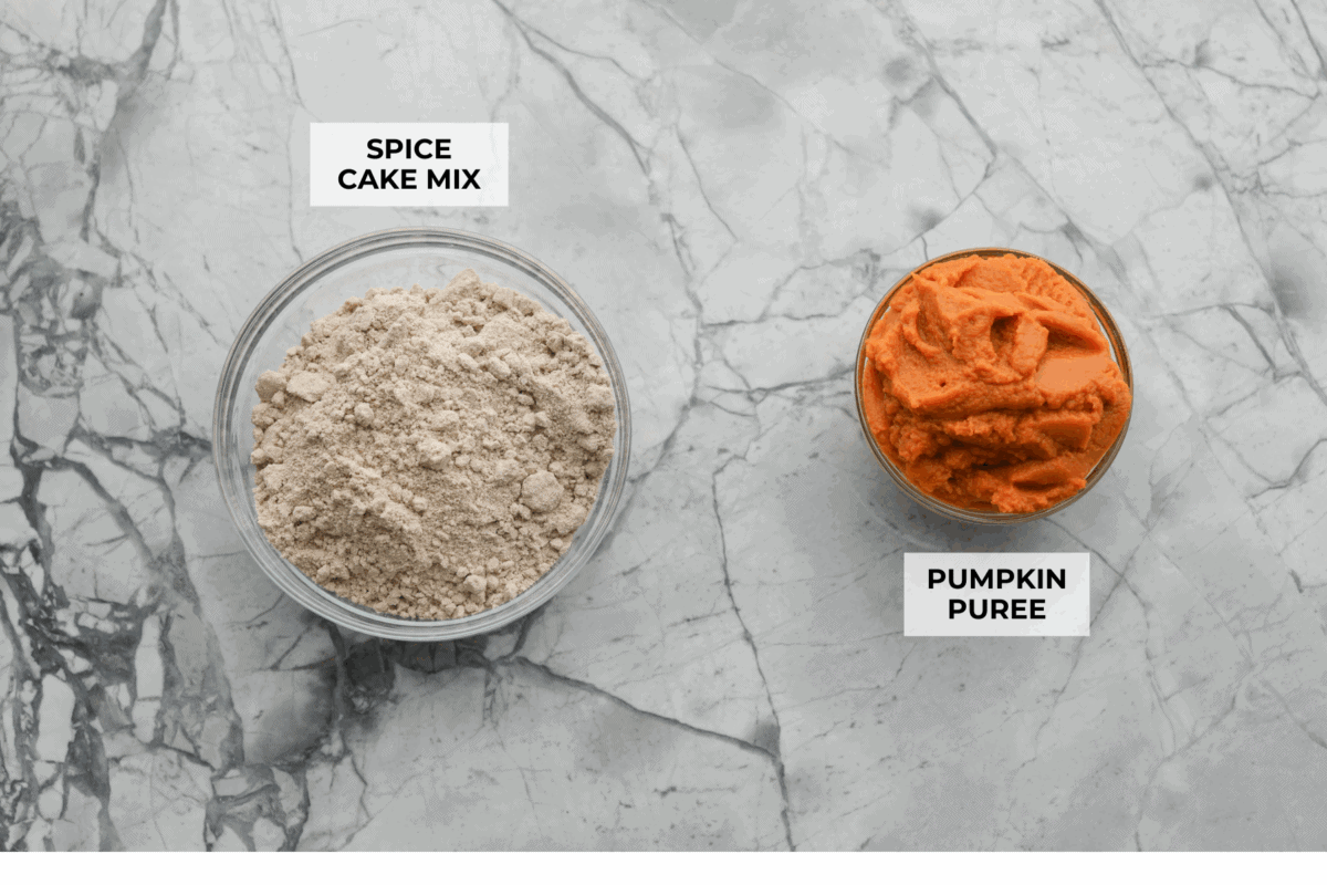 This 2 ingredient pumpkin cake comes together in minutes and bakes up perfectly spiced, tender, and fluffy every single time. It’s the ultimate dessert for any fall gathering or when the sweet tooth hits! Overhead shot of labeled ingredients.