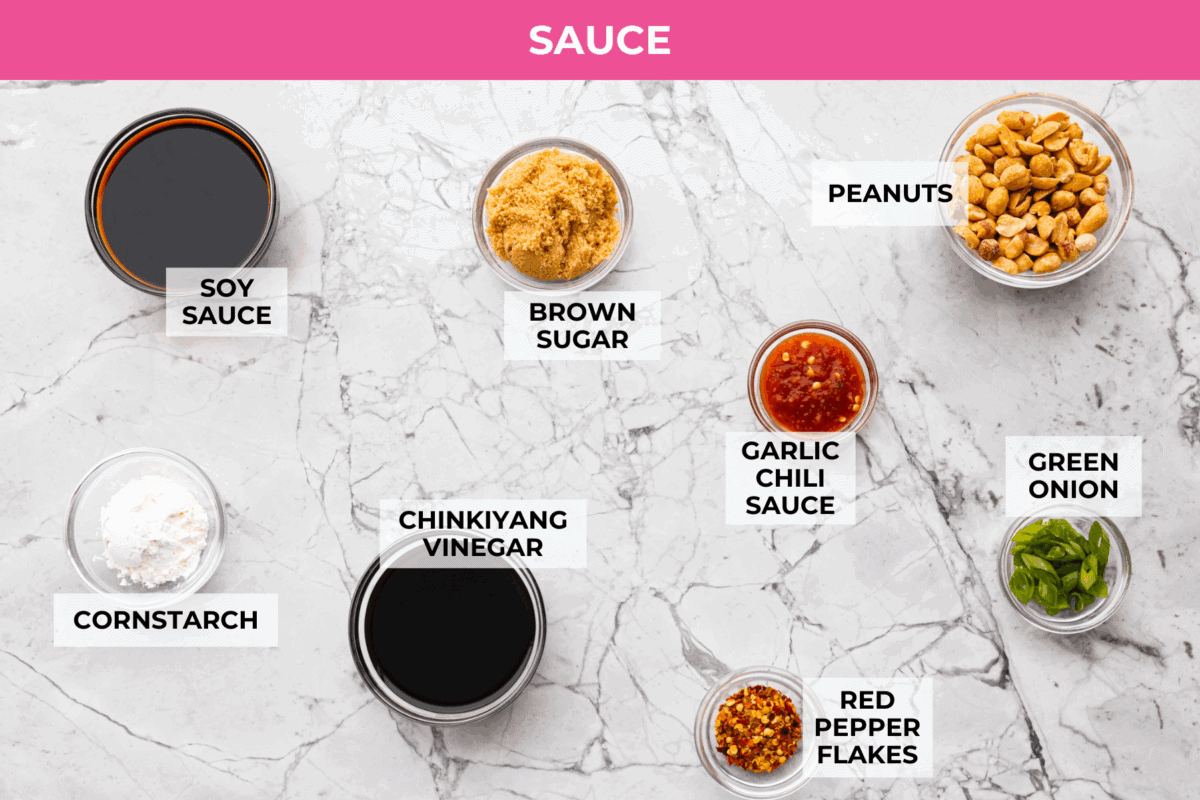Skip the takeout, these Kung Pao Chicken Noodles are spicy, saucy, and loaded with flavor! Tender chicken, chewy noodles, crunchy peanuts, and a kick of heat all come together in one quick and easy dish that’s perfect for weeknight dinners. Overhead shot of the labeled Kung Pao chicken noodles sauce ingredients.