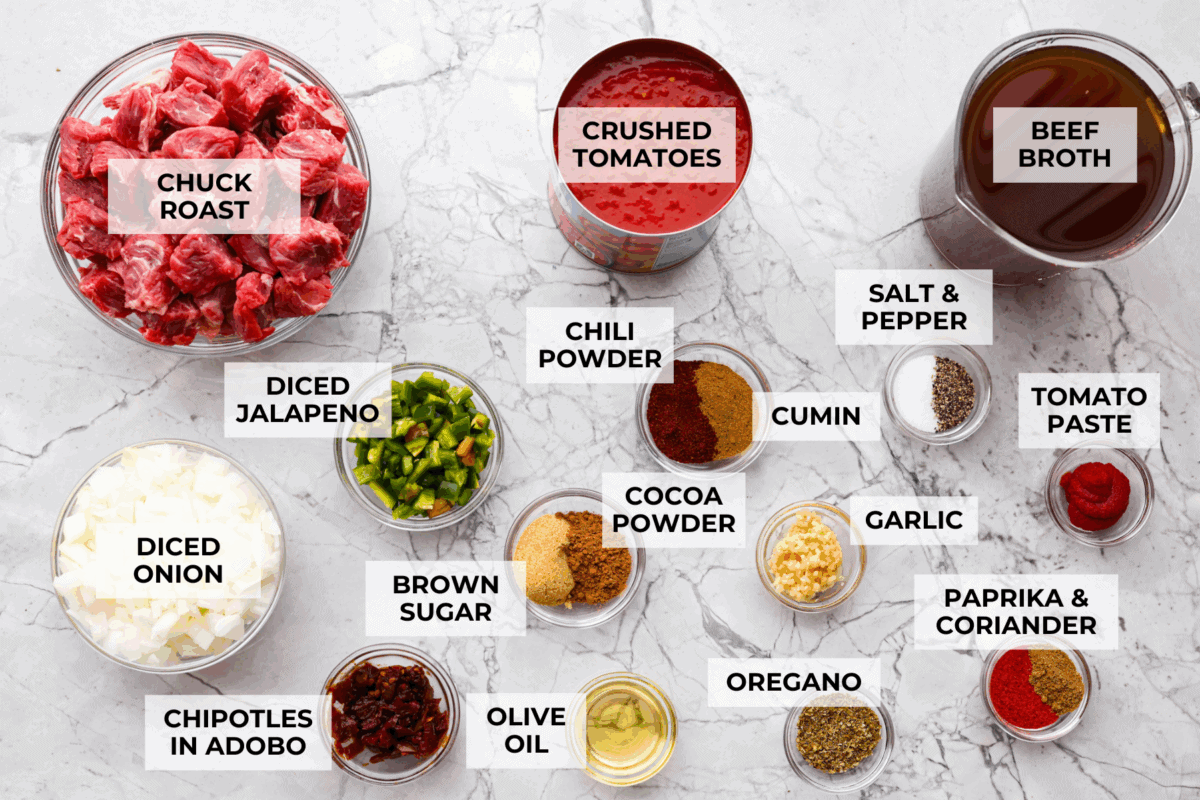 Do you like your chili with beans or without? This authentic Texas chili keeps it classic. Just bold, tender chuck roast, without beans. It has a rich, smoky flavor in every bite. Overhead shot of labeled Texas chili ingredients.