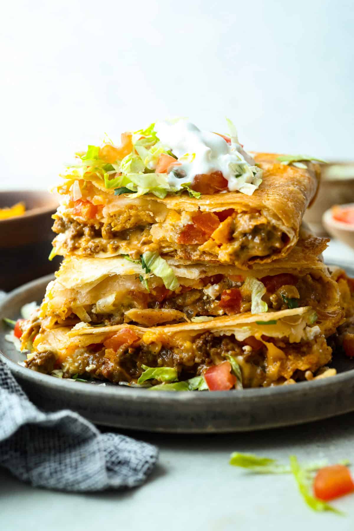 Stacked layers of crunchwrap casserole. 