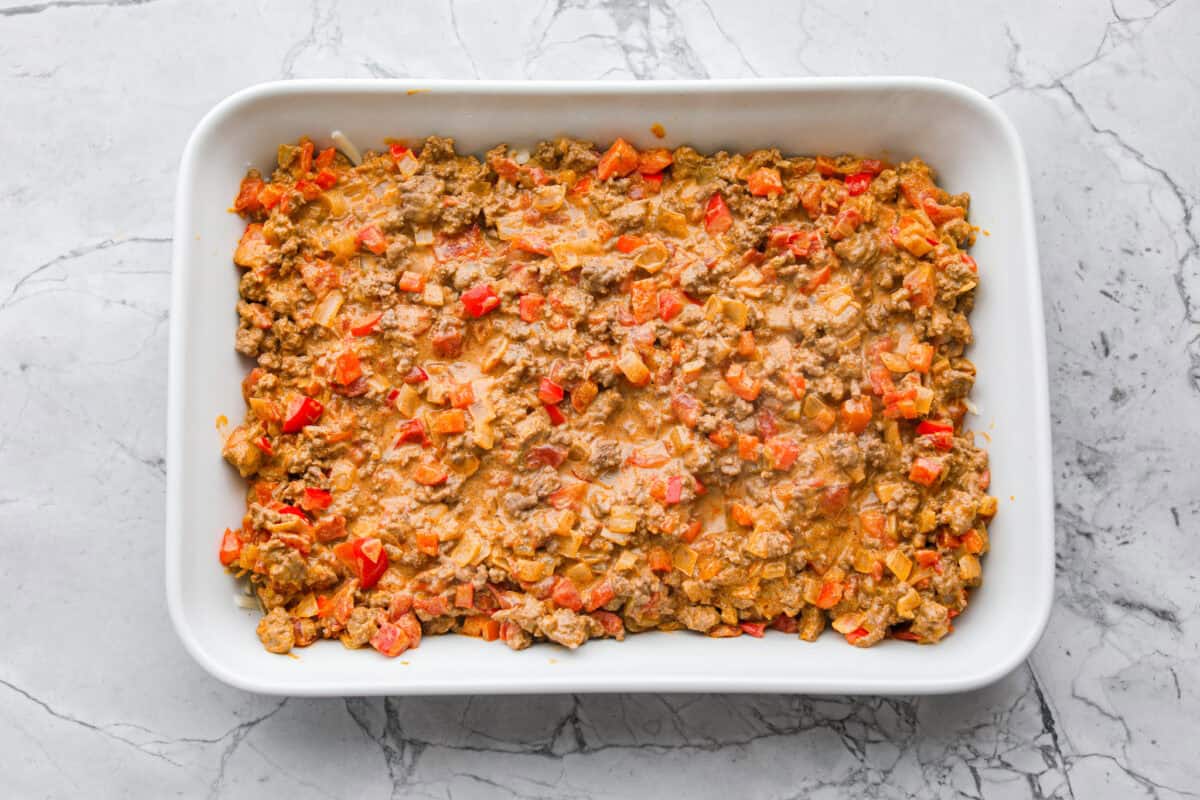 Doritos casserole is everything you love about taco night, just with a crunchy, cheesy twist! It’s crispy, crunchy, creamy, flavorful, and so easy to throw together. Who can say no to chips for dinner? Meat mixture added to the top of the chips and cheese.
