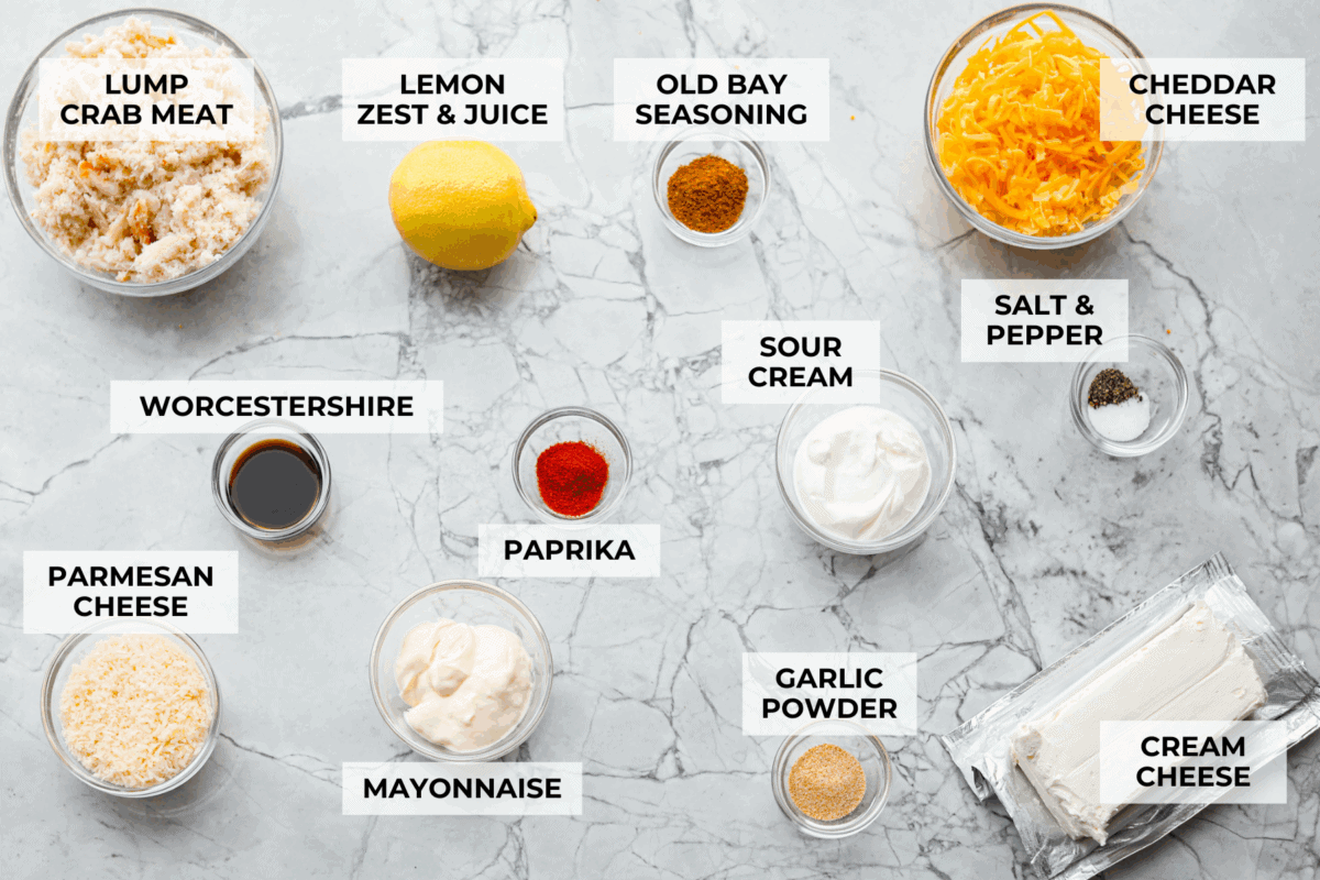My hot crab dip is one of those recipes you have to try. It’s creamy, cheesy, and irresistible. Ready in about 30 minutes, it’s my go-to when I want something that feels fancy but takes zero effort. Overhead image of labeled ingredients.