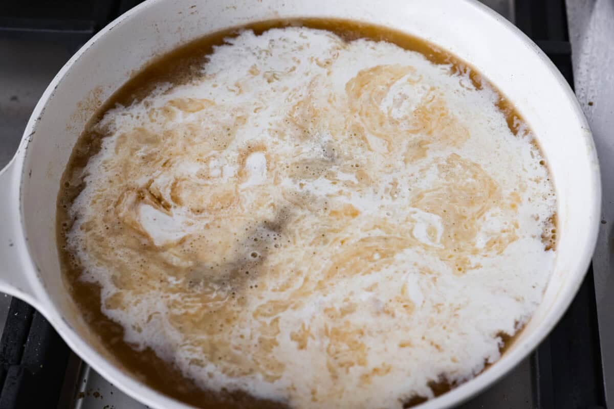 Turn those flavorful pan drippings into the creamiest gravy with a hint of tang. This sour cream gravy is rich, smooth, and so versatile. It's perfect over mashed potatoes, pork chops, but especially on my favorite Swedish Meatballs. Broth, cream and a couple ingredients added to the roux.