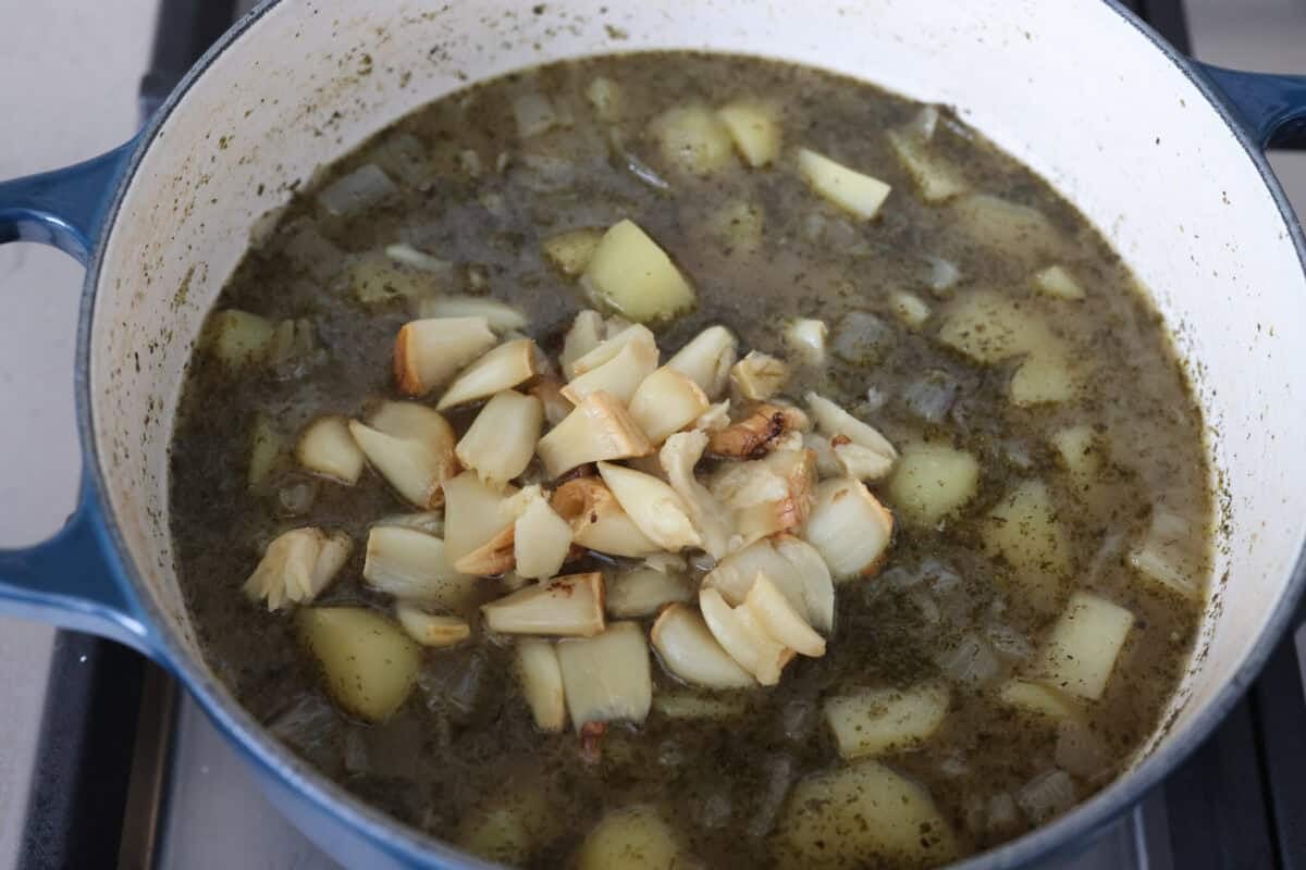 Roasted garlic added to the pot of cooked potatoes.