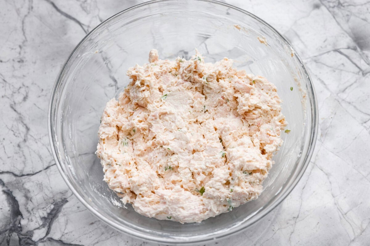 Overhead shot of the chicken mixture ingredients mixed together. 
