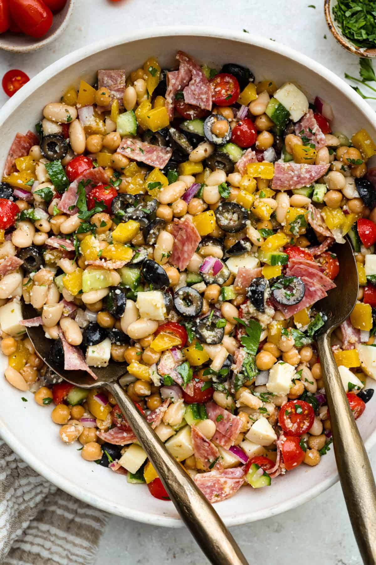 TikTok creator Violet Witchel made this dense bean salad go viral for good reason. It’s simple, high in fiber, protein-packed, and stays delicious for days. My version keeps the same hearty texture and zesty flavor that made her trend explode. Overhead shot of a bowl of dense bean salad.