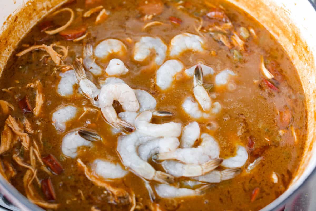 After listening to your feedback and learning what makes a great New Orleans gumbo, I made some changes. This version is richer, more balanced, and way closer to the real deal, without being overwhelming to make at home. Raw Shrimp added to the pot.