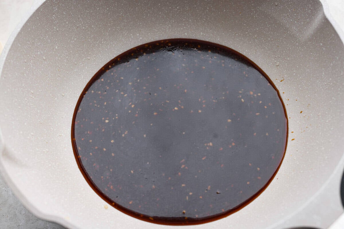 You love my baked General Tso’s chicken, so obviously, I had to make a faster one. This one pan General Tso's chicken is sticky, saucy, and on the table in about 30 minutes. One pan general Tso's sauce added to the skillet.