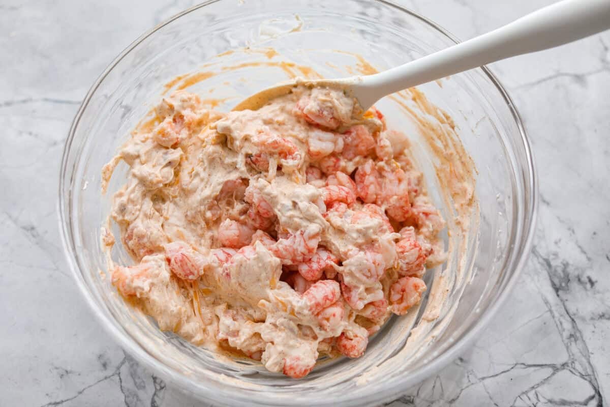 If you love a good lobster rolls, you’ll love it even more as a dip. Creamy, cheesy, and loaded with tender lobster, serve it warm, grab some crackers or bread, and let the dipping begin! Lobster added to the dip mixture.
