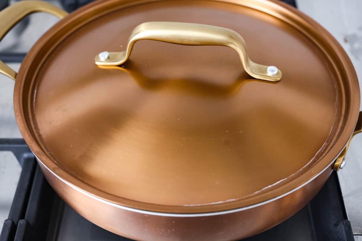 Lid on top of the skillet while it cooks.