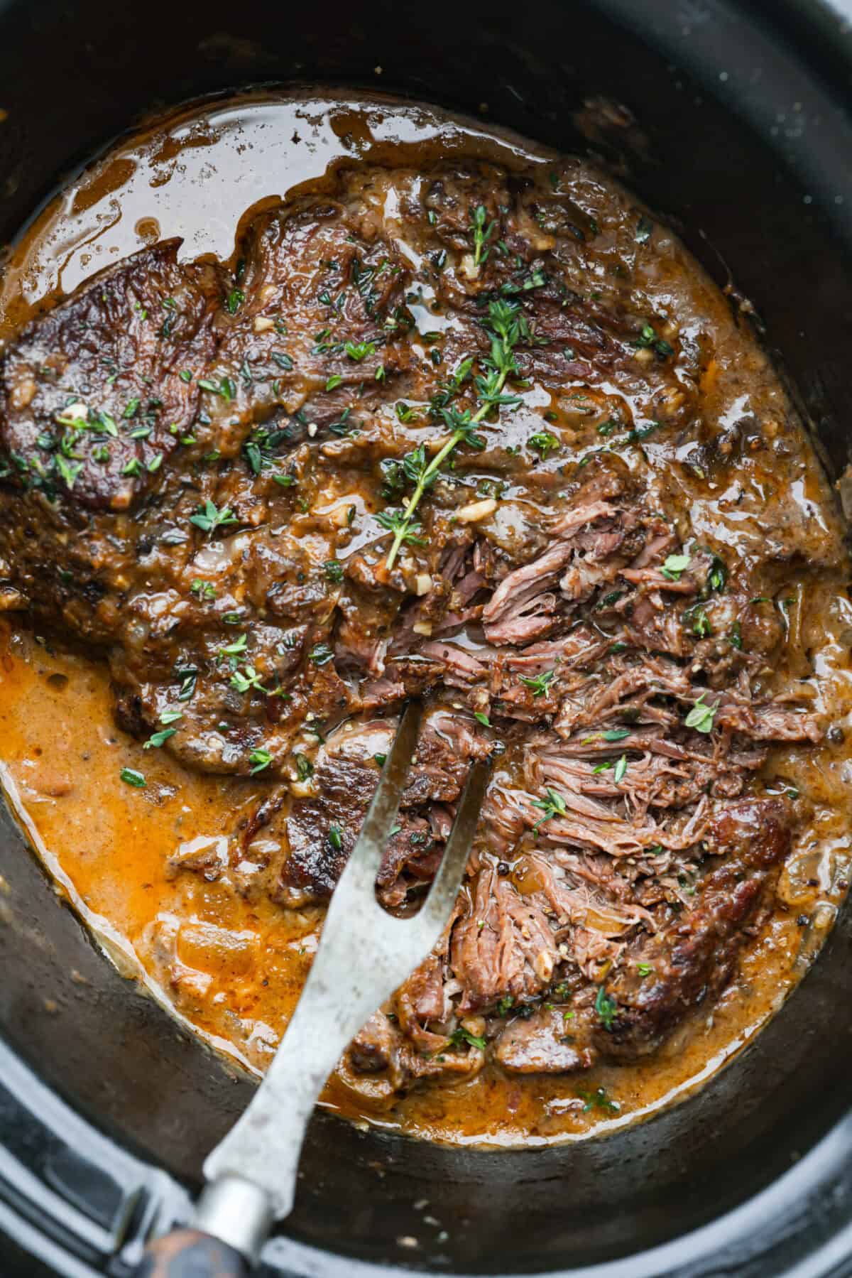 This horseradish pot roast is pure comfort food with a flavorful twist. The beef cooks low and slow until fork-tender, soaking up a rich, savory sauce with just enough horseradish to add depth without being overwhelming. Horseradish pot roast in a slow cooker.