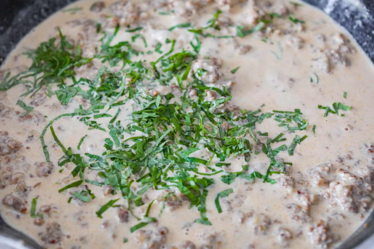 Fresh basil and salt and pepper added to the sausage mixture. 