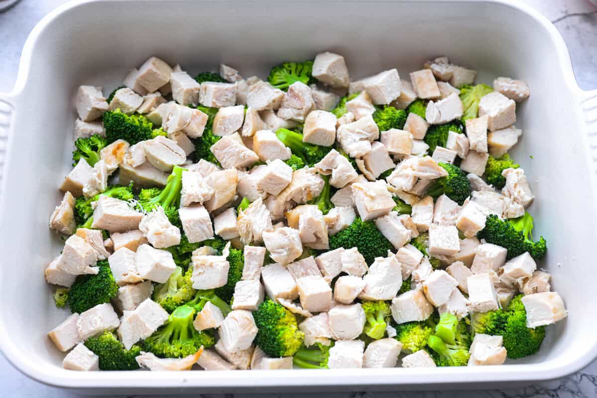 Chicken Divan is what I make when I want comfort food that still feels a little put-together. You get tender chicken, crisp-tender broccoli, and a creamy sauce bubbling under the most delicious golden, crunchy topping! Cubed chicken added to the broccoli.