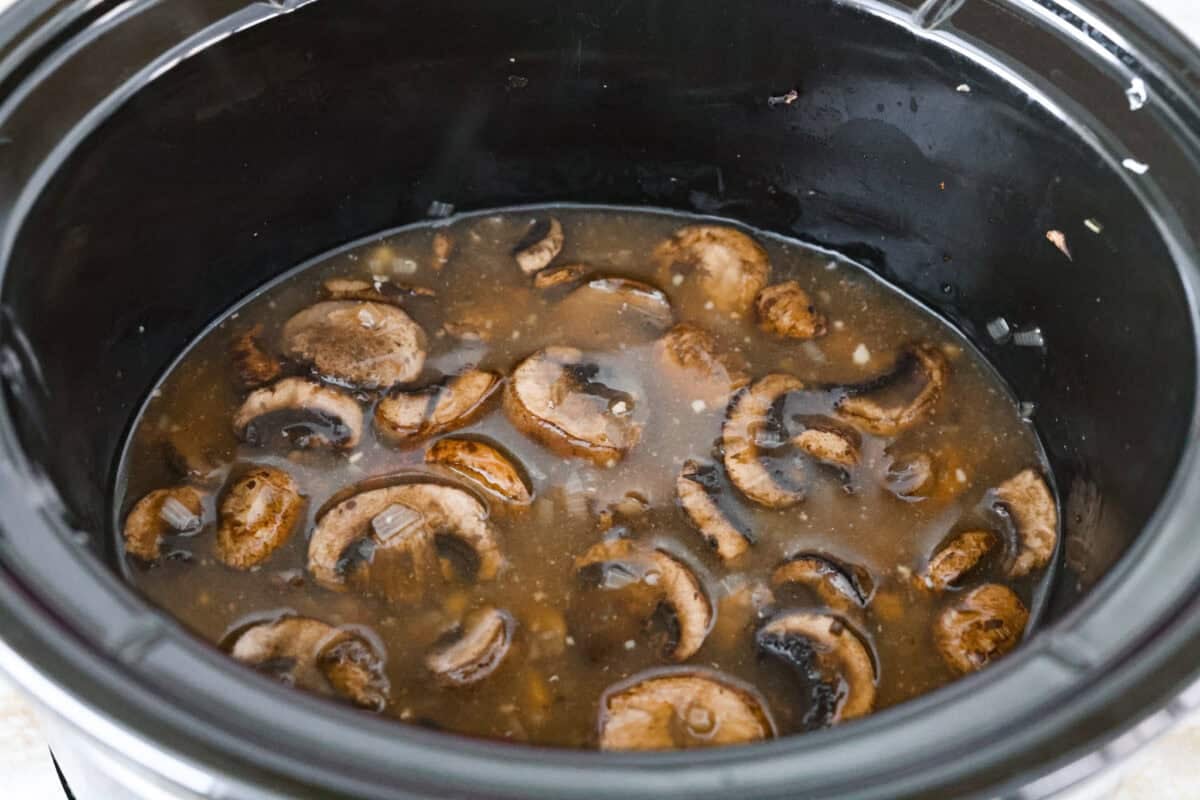 Sauce ingredients added to the crockpot. 