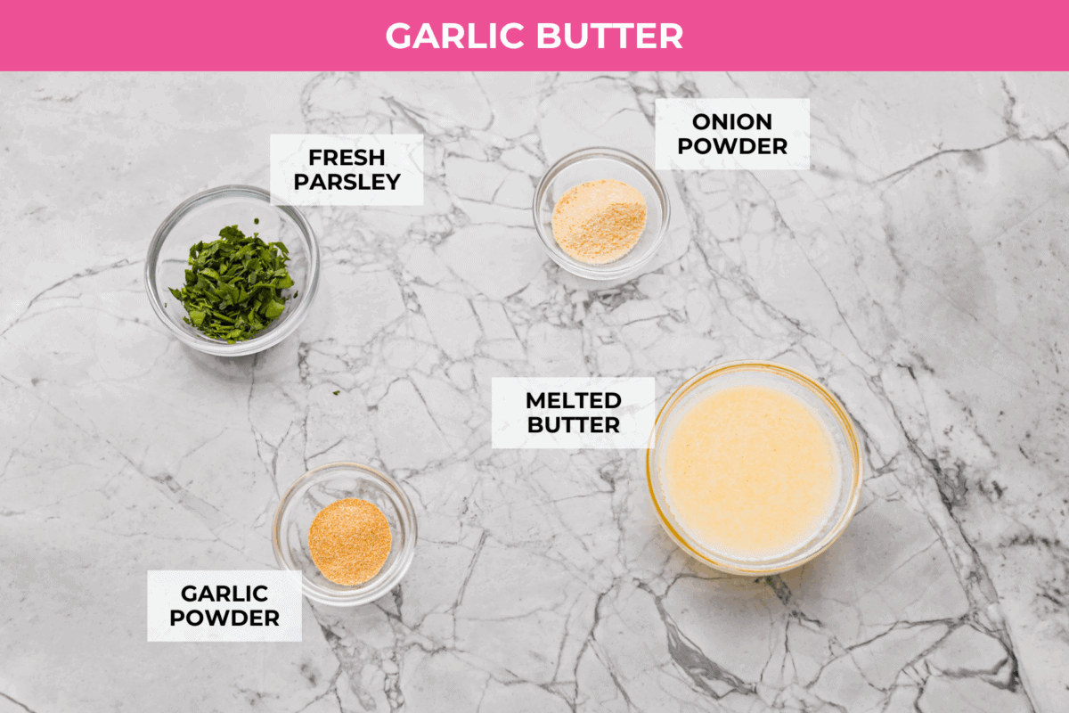 Overhead shot of labeled garlic butter sauce ingredients. 