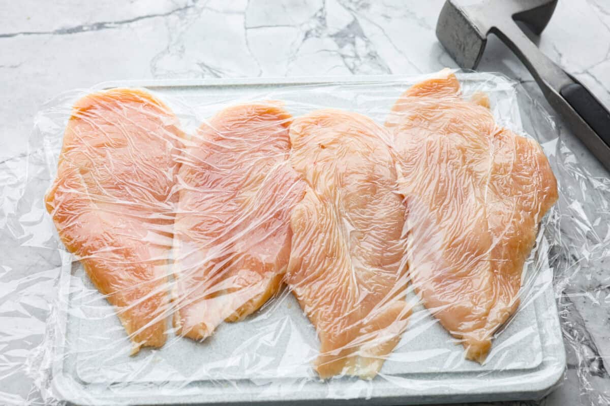 Chicken cut thin and then pounded with a meat mallet in between plastic wrap. 