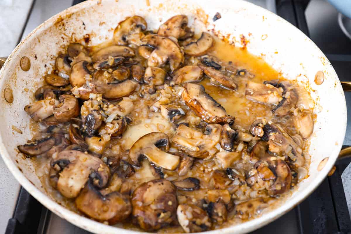 This chicken Diane takes everything you love about steak Diane and turns it into an easy chicken dinner. One skillet, a rich creamy mushroom sauce, and tons of flavor in every bite! Brandy or cognac added to the mushroom mixture.