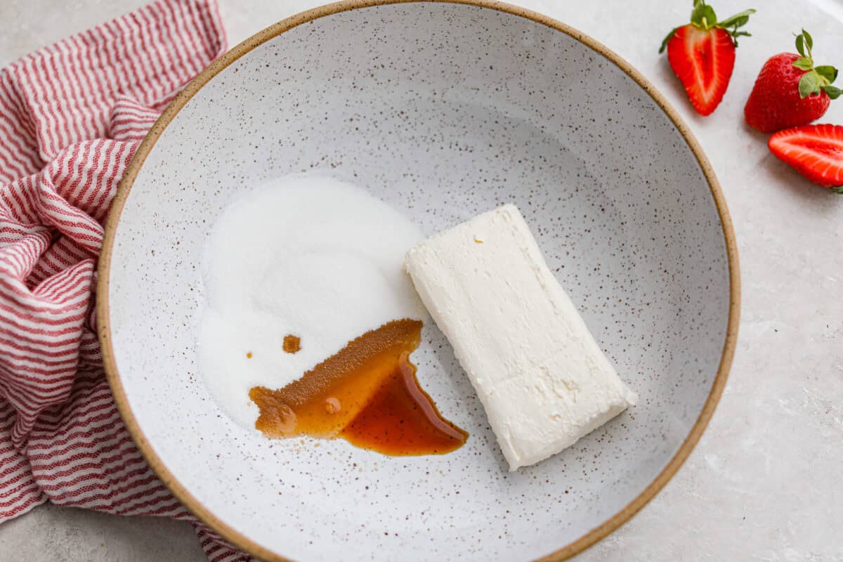 This is the bowl where you mix the sugar, cream cheese, and vanilla extract. 