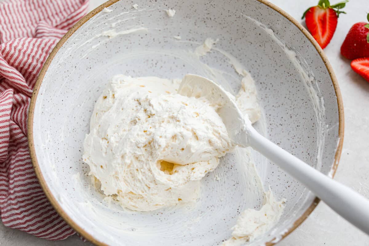 Cream cheese mixture topped with whipped topping. 