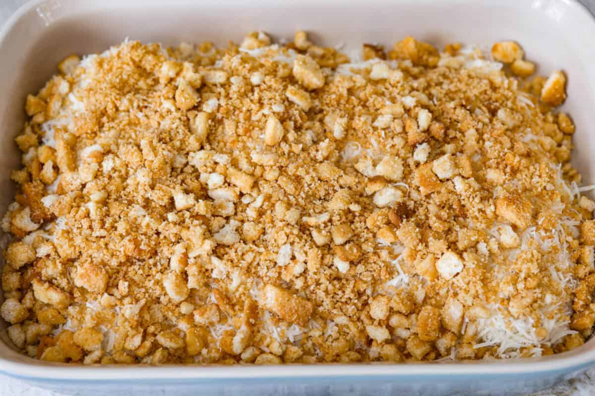 Crushed croutons on top of the parmesan cheese. 