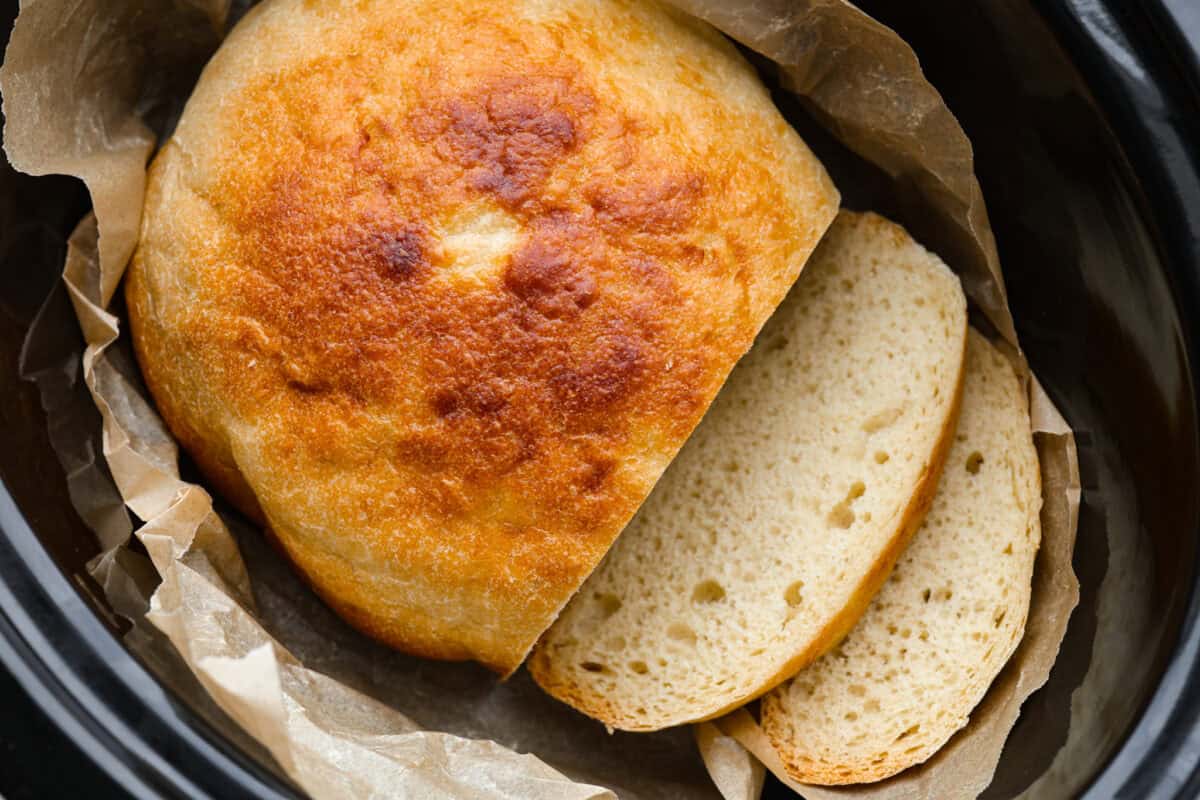 Browned slow cooker bread sliced and placed back in the corckpot.