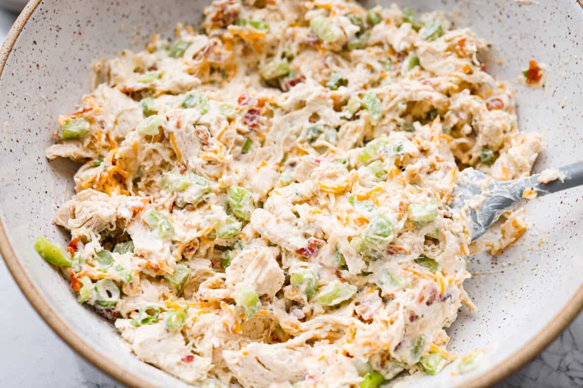 All of the ingredients for crack chicken salad all mixed together. 