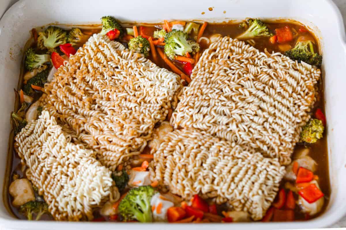 Sauce dumped over the veggies and noodles. 
