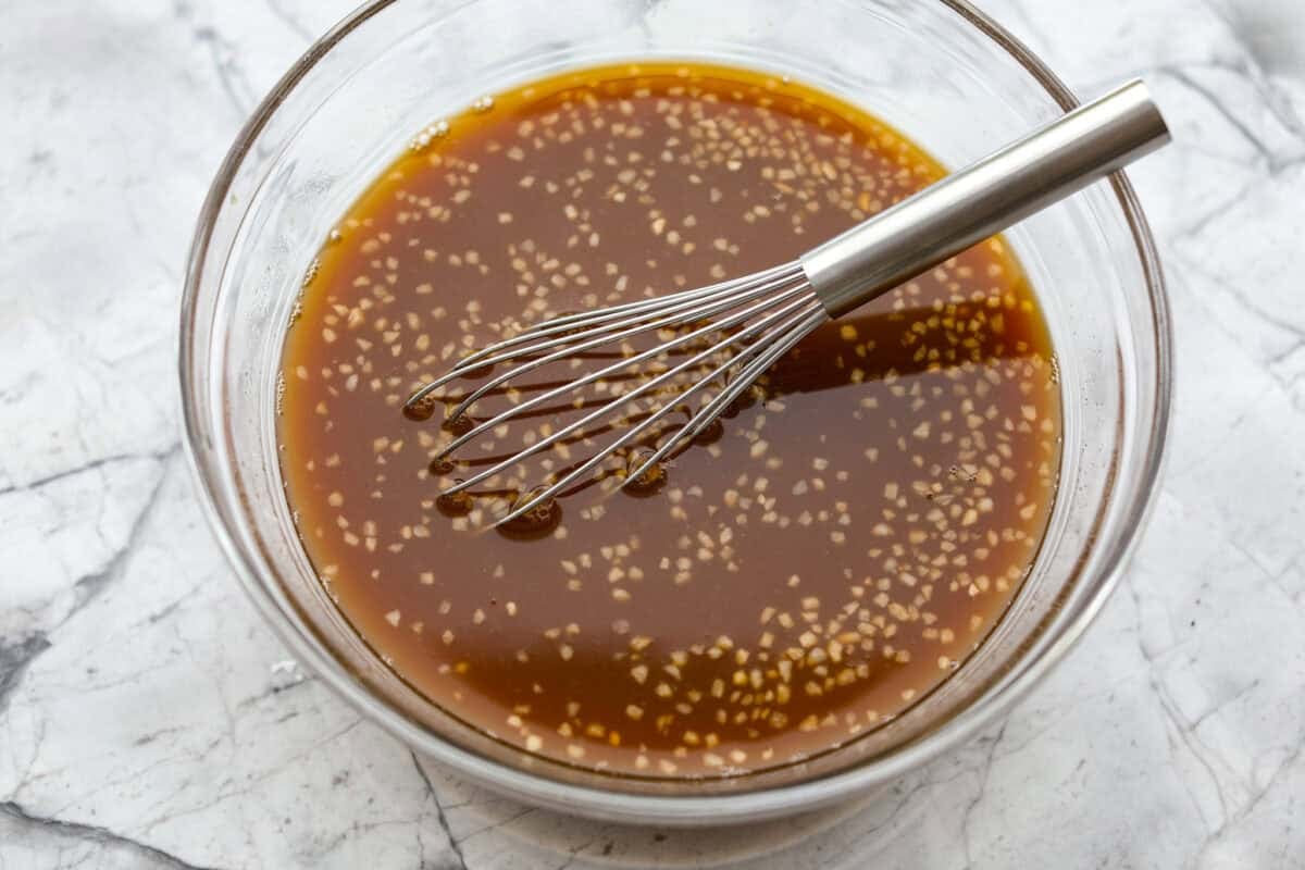 Sauce ingredients whisked together in a bowl. 