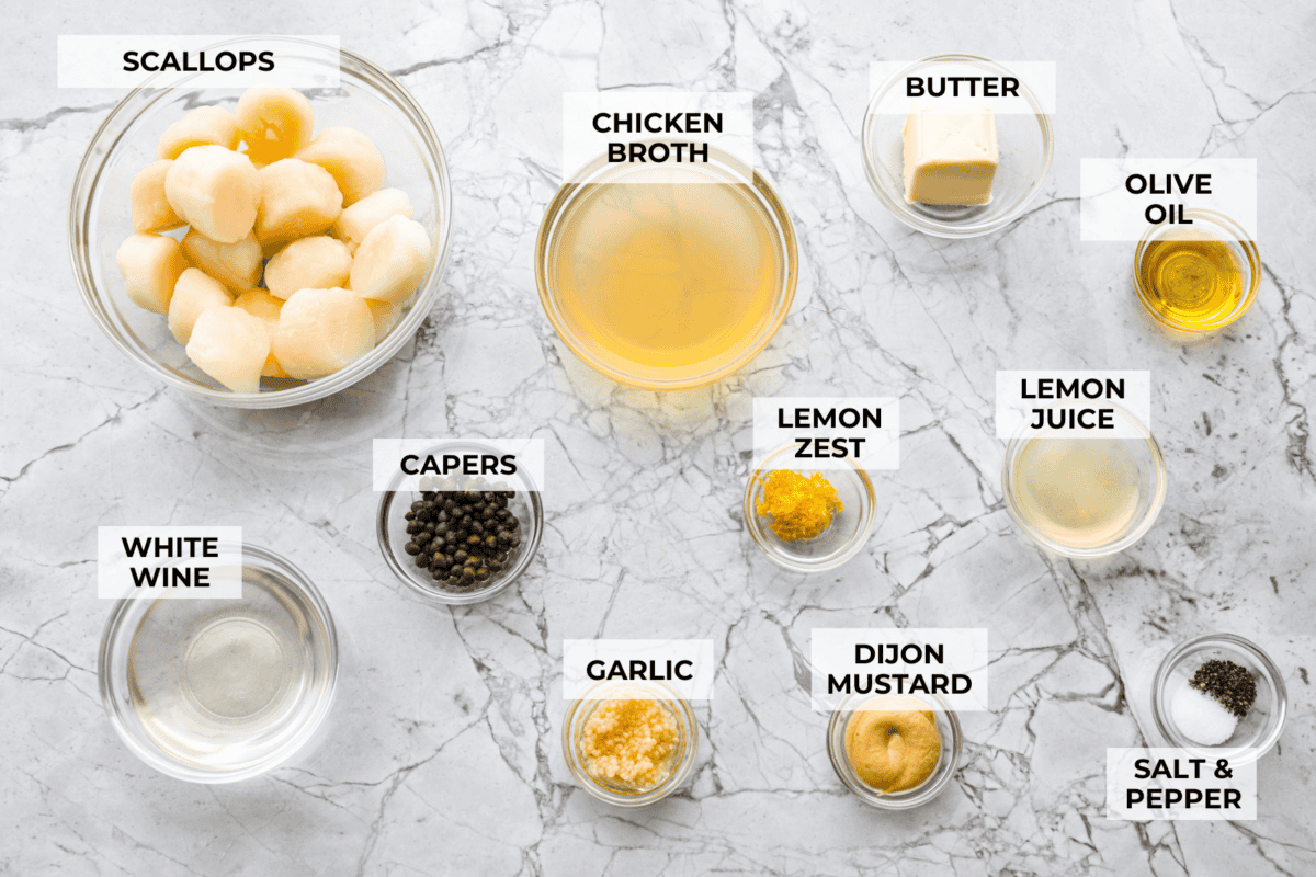 Overhead shot of labeled pan seared scallops ingredients. 