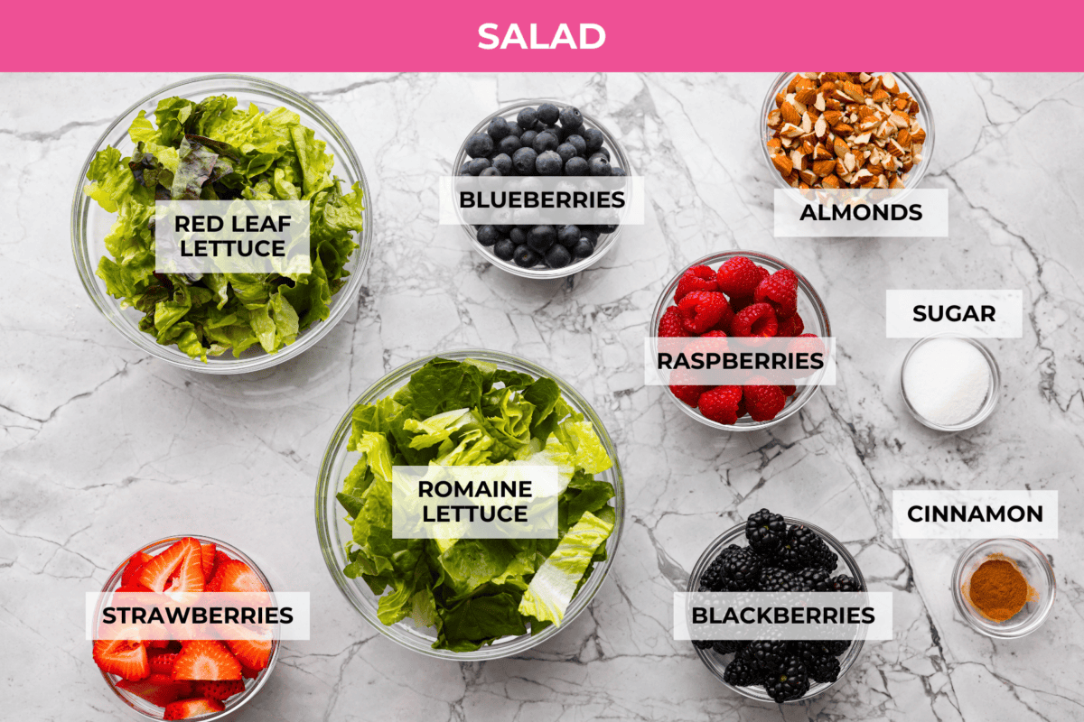 Overhead shot of labeled salad ingredients. 