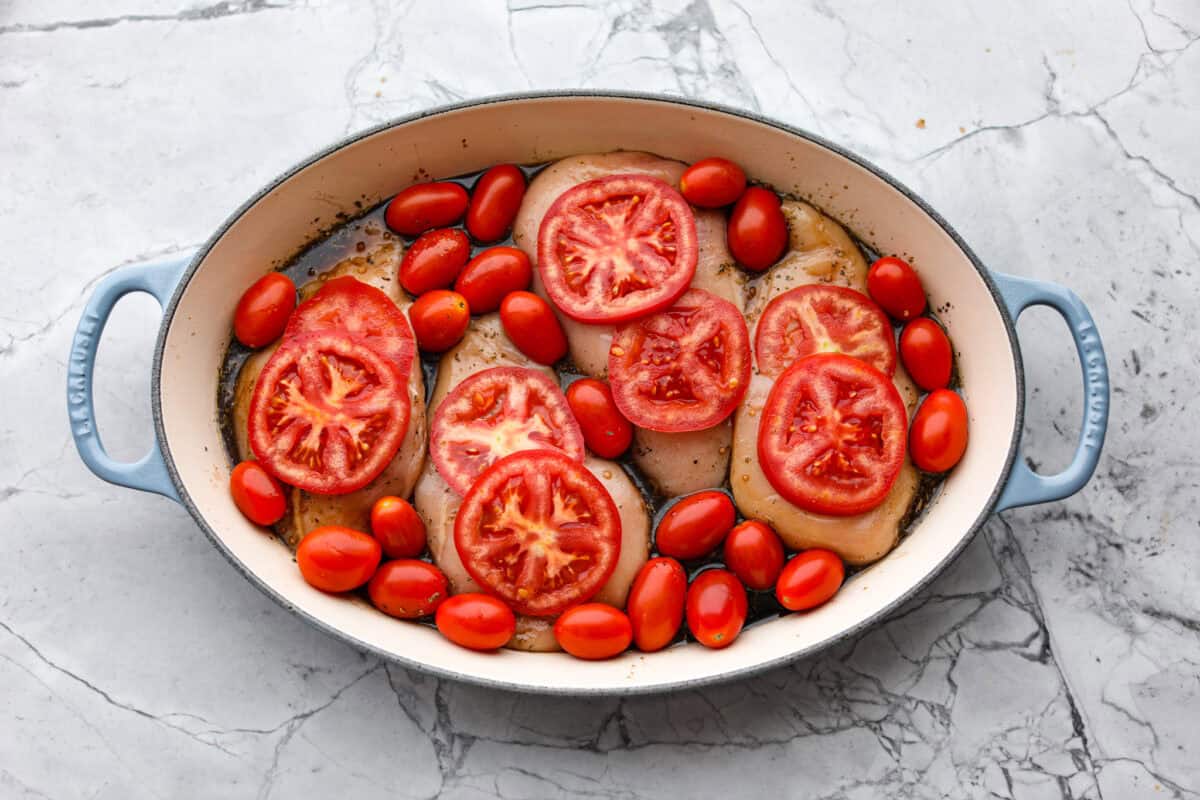 Tomatoes added to the pan. 