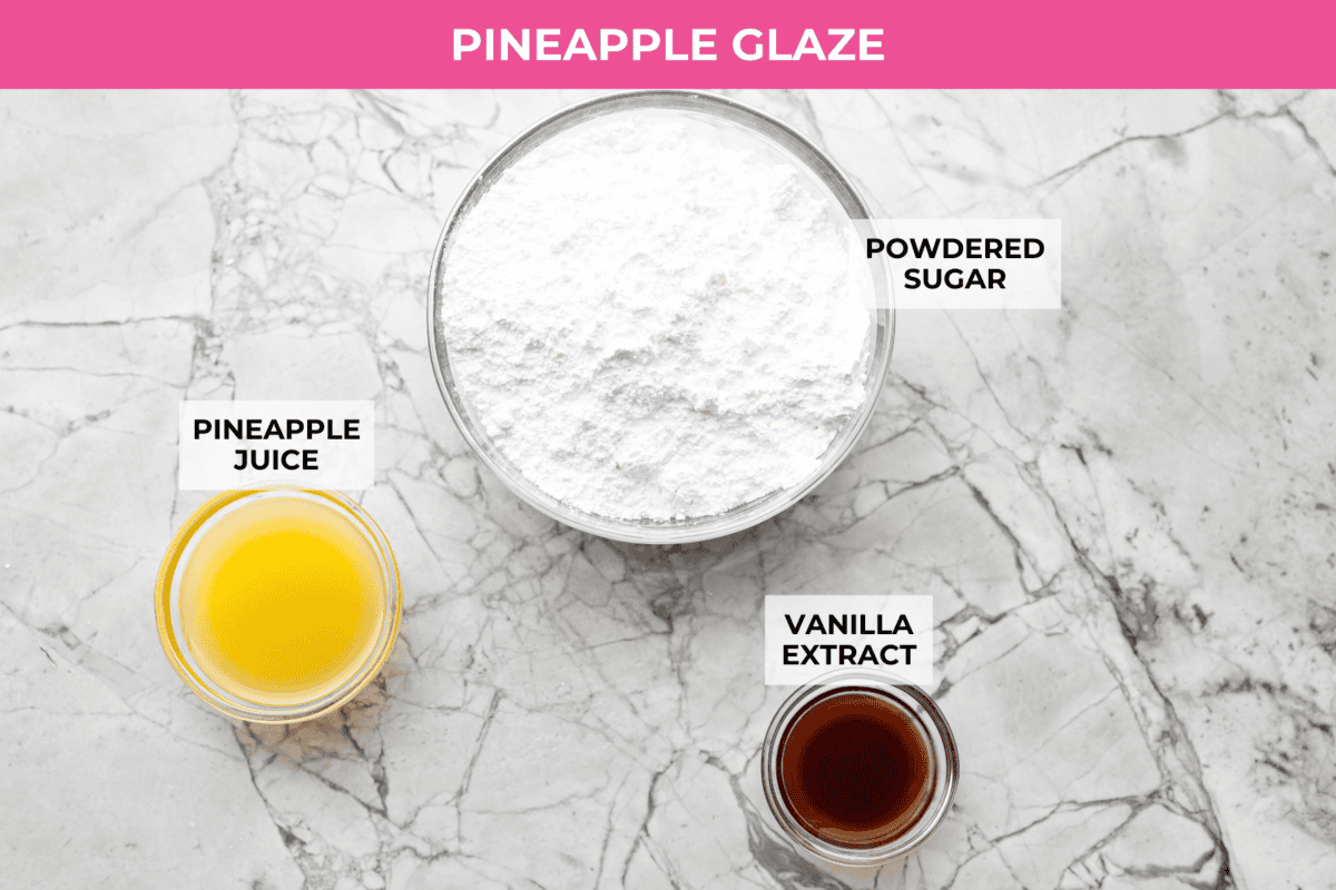 This glazed pineapple bread is what happens when a cozy quick bread meets a tropical vacation. Moist, tender, and drizzled with a sweet pineapple glaze, it's a taste of paradise in every bite. Overhead shot of labeled glaze ingredients.