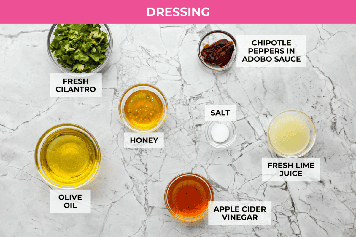 I love salads in the summer, and this grilled shrimp salad is such a good one. It’s fresh, colorful, and filling without feeling heavy. And the dressing? Oh my gosh. The chipotle-lime flavor is so good, you’ll want to pour it on everything. Overhead shot of labeled dressing ingredients.