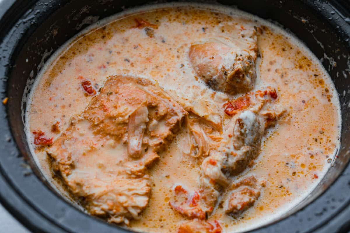 Marry Me Pork Roast lives up to its name! Tender pork, slow cooked in a creamy, garlicky sun-dried tomato sauce that's so good! Pile it over mashed potatoes or buttered noodles to soak up every drop. Cream added to the slow cooker.