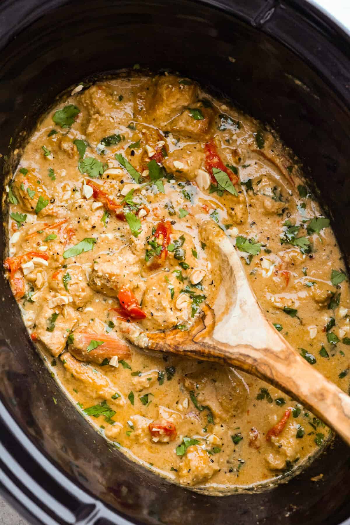 Slow cooker Thai Peanut chicken in a crockpot. 