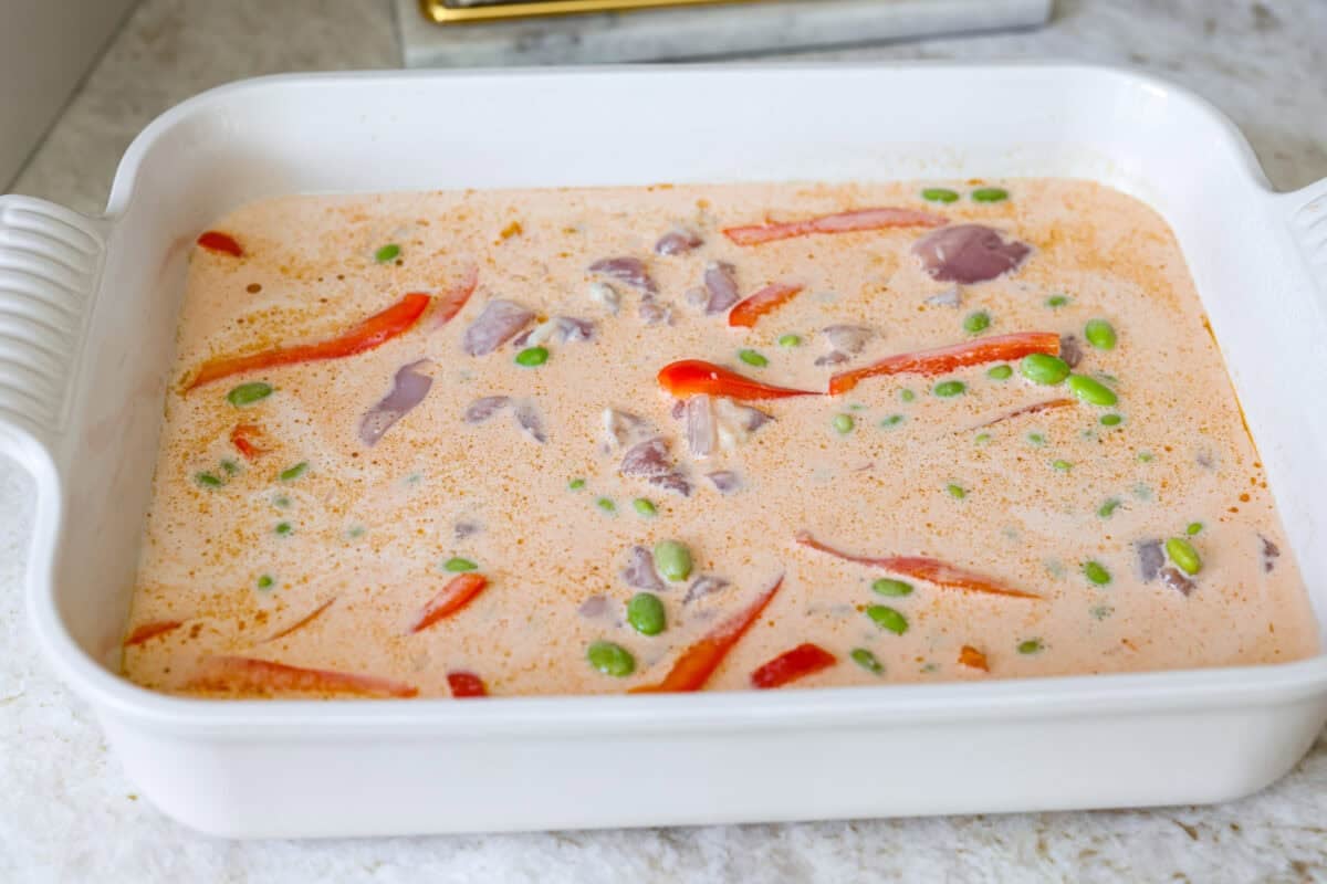 All of the ingredients mixed together in the baking dish. 