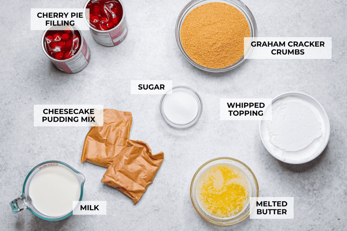 Overhead shot of labeled cherry cheesecake lush ingredients. 