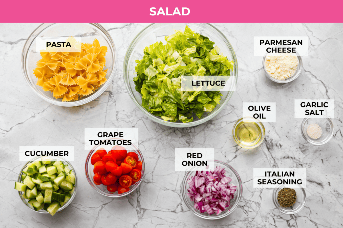 The viral crispy pasta salad trend is here, and it’s easy to see what the hype is about! Golden, crunchy pasta is tossed with fresh veggies and a creamy dressing for a fun upgrade that’s anything but boring. Overhead shot of labeled crispy pasta salad ingredients.