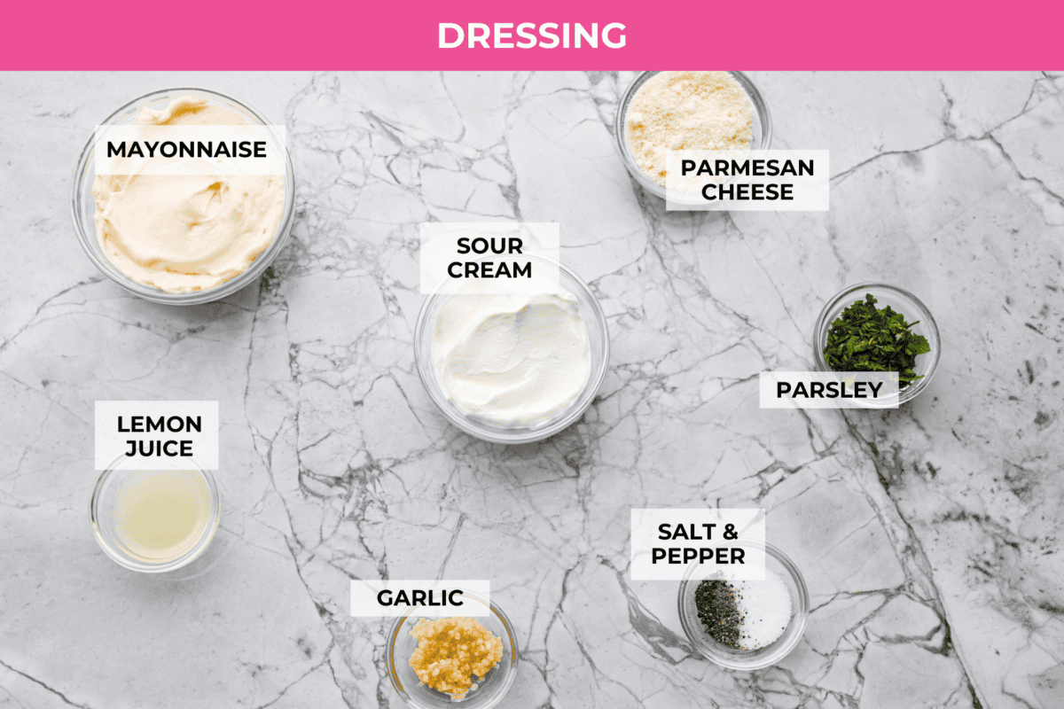 The viral crispy pasta salad trend is here, and it’s easy to see what the hype is about! Golden, crunchy pasta is tossed with fresh veggies and a creamy dressing for a fun upgrade that’s anything but boring. Overhead shot of labeled dressing ingredients.