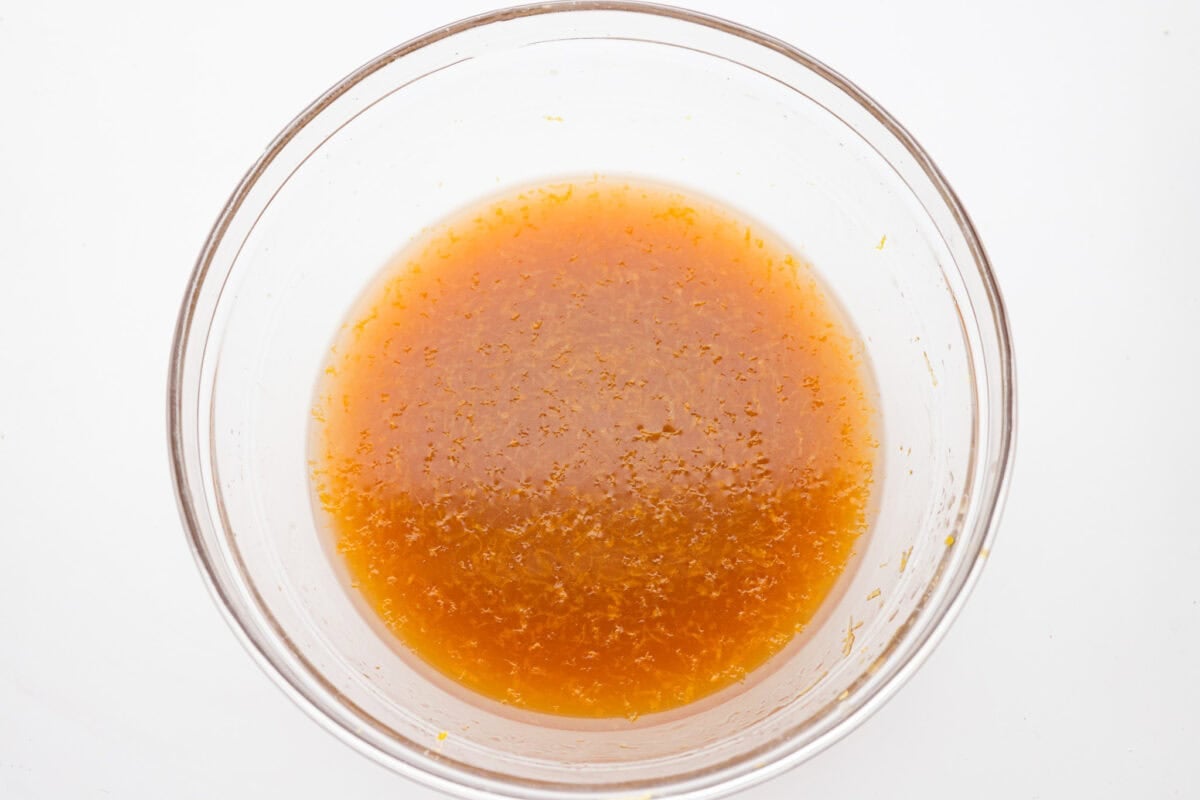 Bowl of Chinese lemon chicken sauce mixed together. 