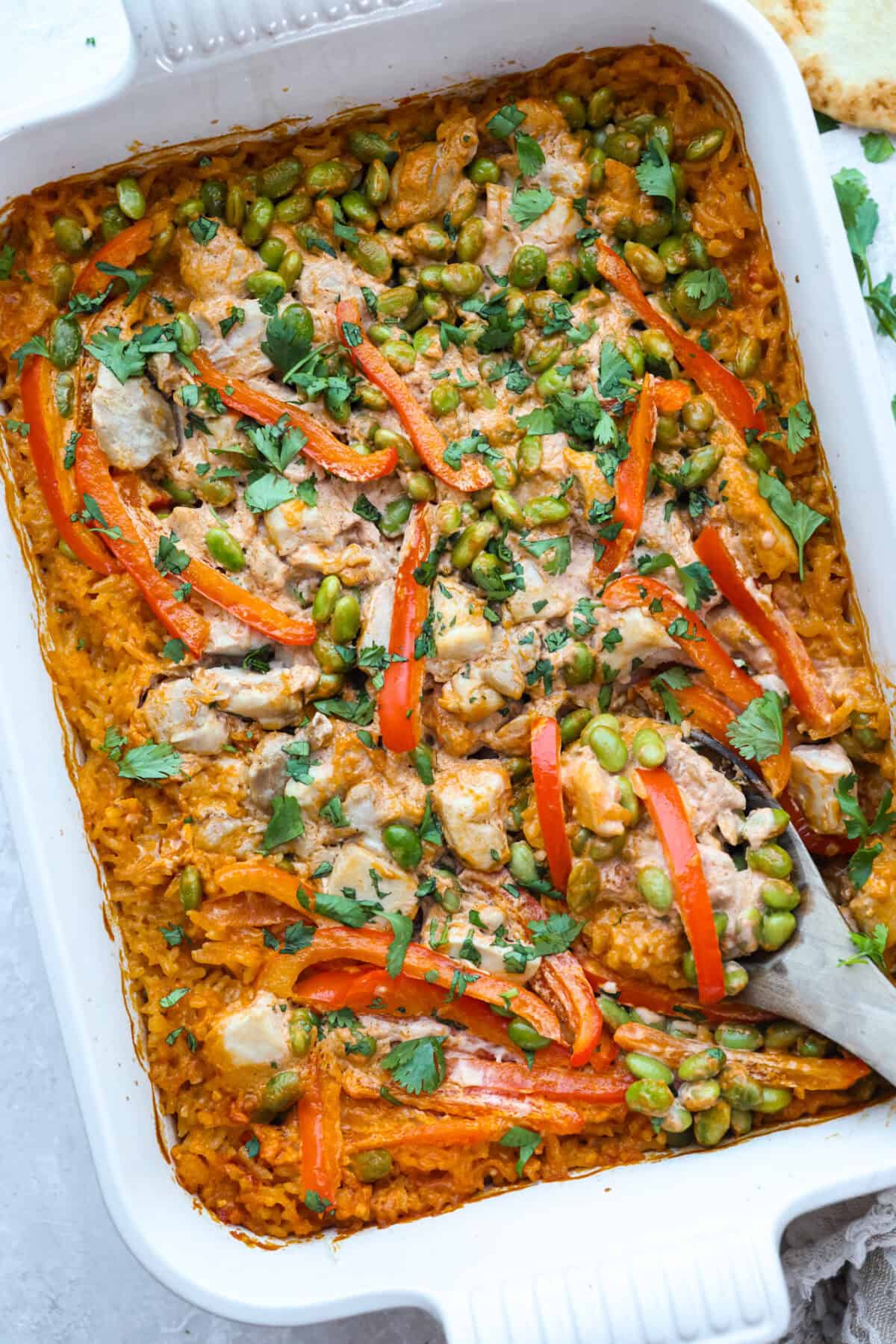 Coconut curry chicken bake all cooked upin a baking dish. 