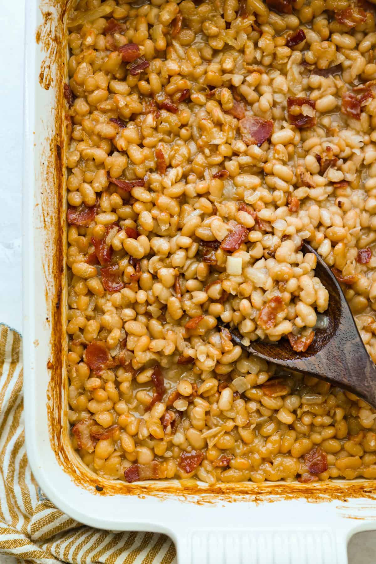 Overhead shot of Grandma Browns baked beans cooked in a baking dish. 