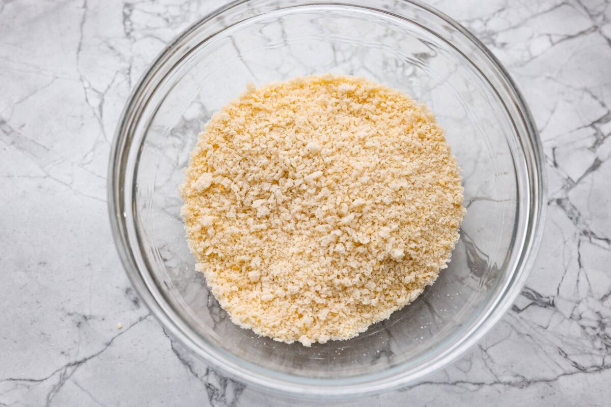 Breadcrumbs and parmesan cheese combined in a mixing bowl. 