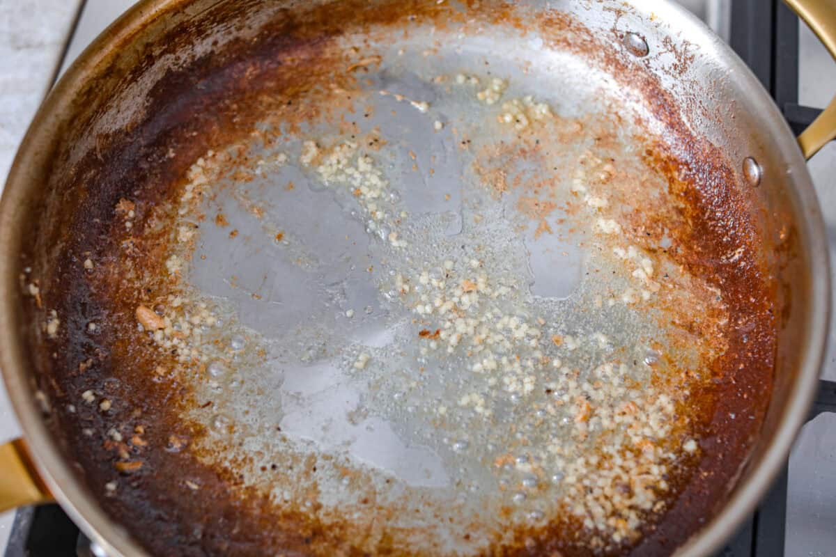 Deglazing the pan.