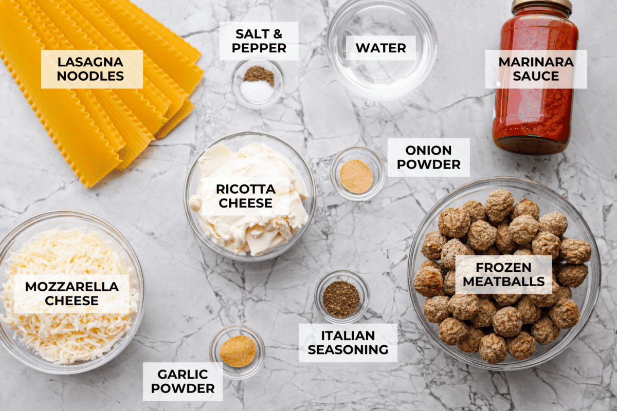 Overhead shot of labeled lazy meatball lasagna ingredients. 