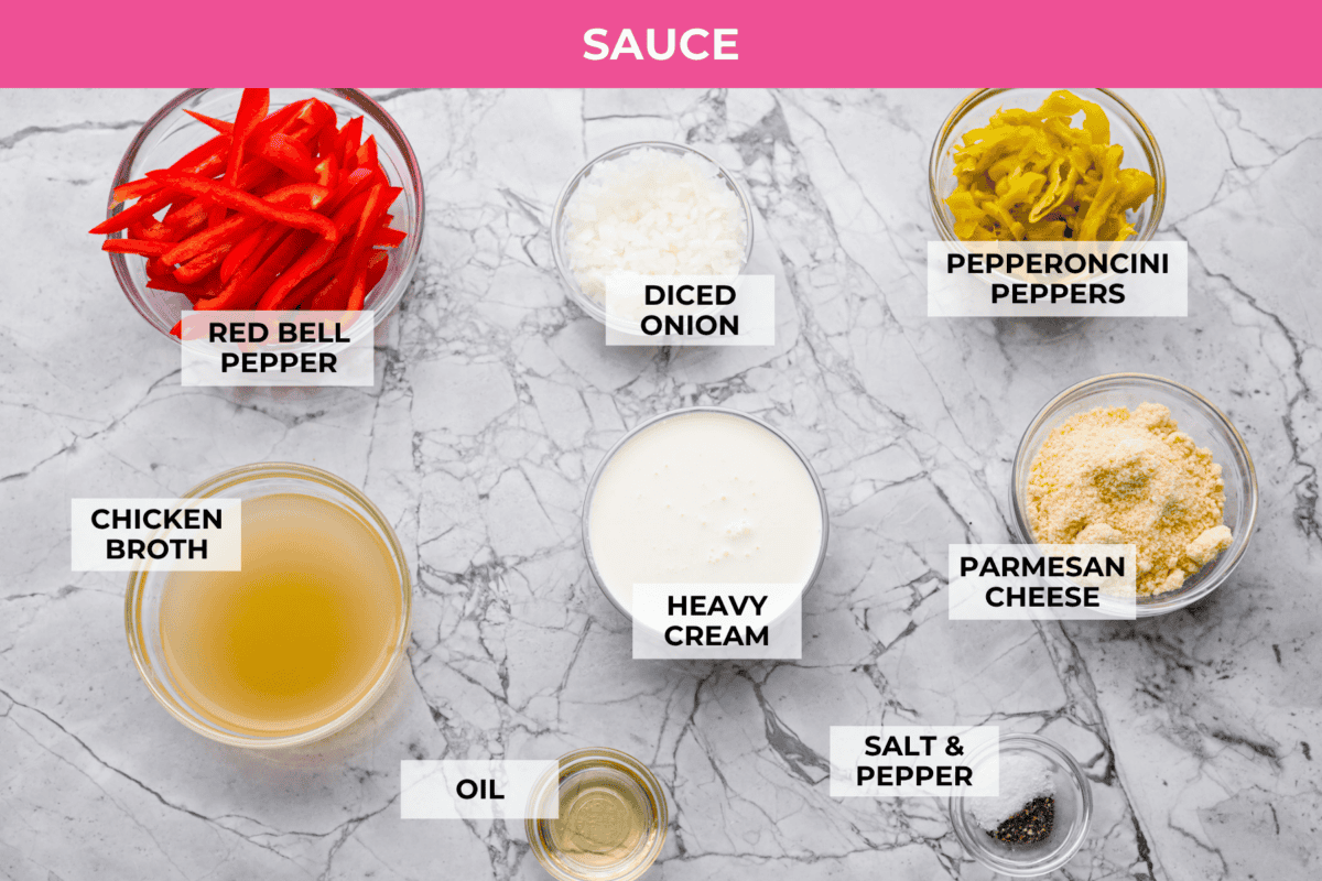 Creamy pepperoncini chicken is an easy one-skillet dinner packed with flavor! Tender chicken is smothered in a rich Parmesan cream sauce with bell peppers and tangy pepperoncini. It's the perfect balance of creamy, savory, and zesty flavor. Overhead shot of labeled sauce ingredients.
