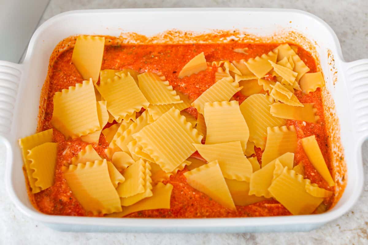 Lasagna noodles broken apart and added to the sauce and cheese mixture. 