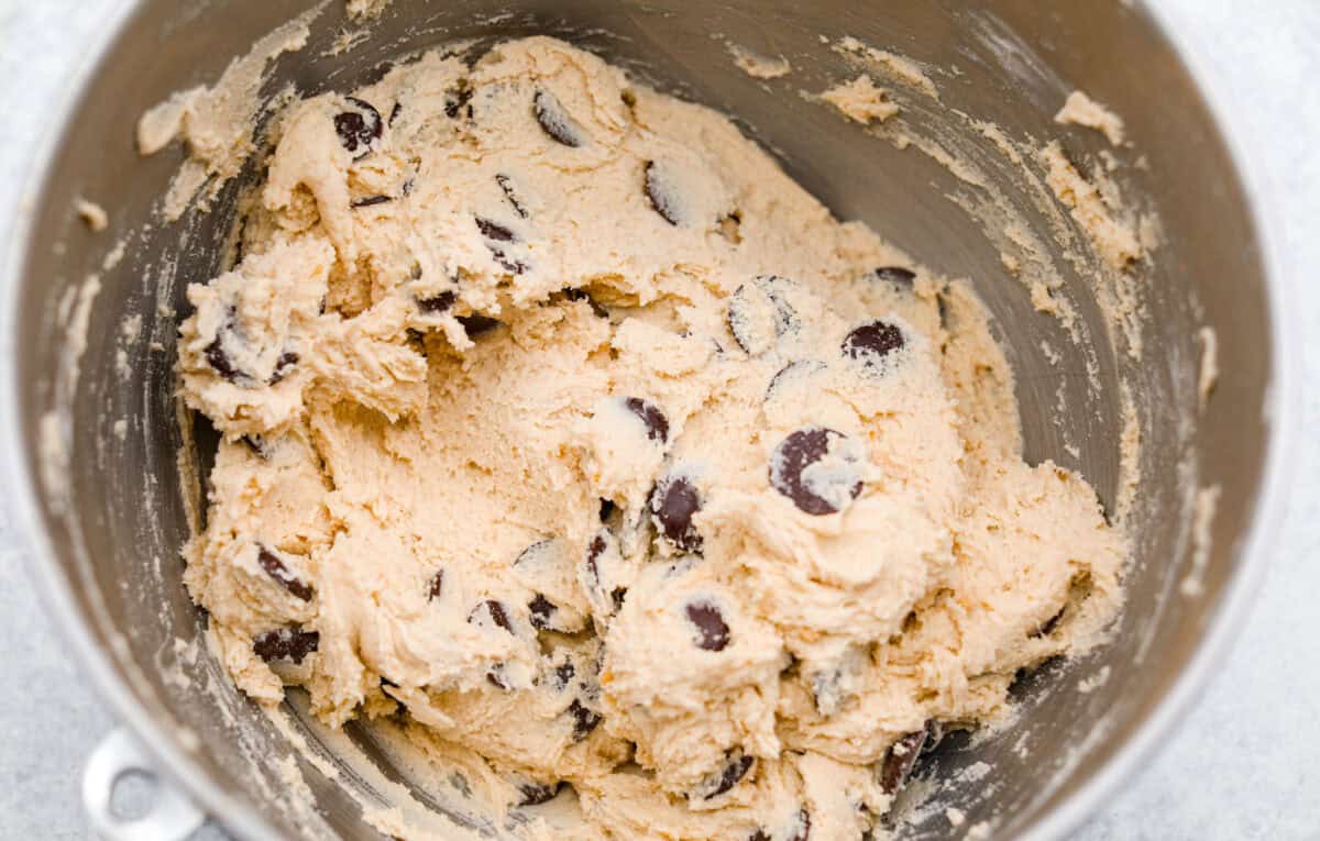 Jacques Torres Chocolate Chip Cookies come from the famous “Mr. Chocolate” himself. They were featured in The New York Times’ search for the perfect chocolate chip cookie. The secret is letting the dough rest before baking. It gives you crisp, buttery edges and chewy centers. Chocolate disks added to the cookisd dough.