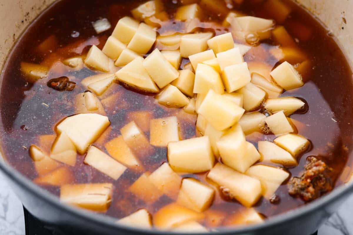 Shepherd’s pie soup has all the cozy, comforting flavors of classic shepherd’s pie in one hearty bowl! Think savory beef, tender potatoes, vegetables, and melted cheddar in a rich, creamy broth. It’s classic comfort food with a fun twist! Beef broth and diced potatoes added to the pot.