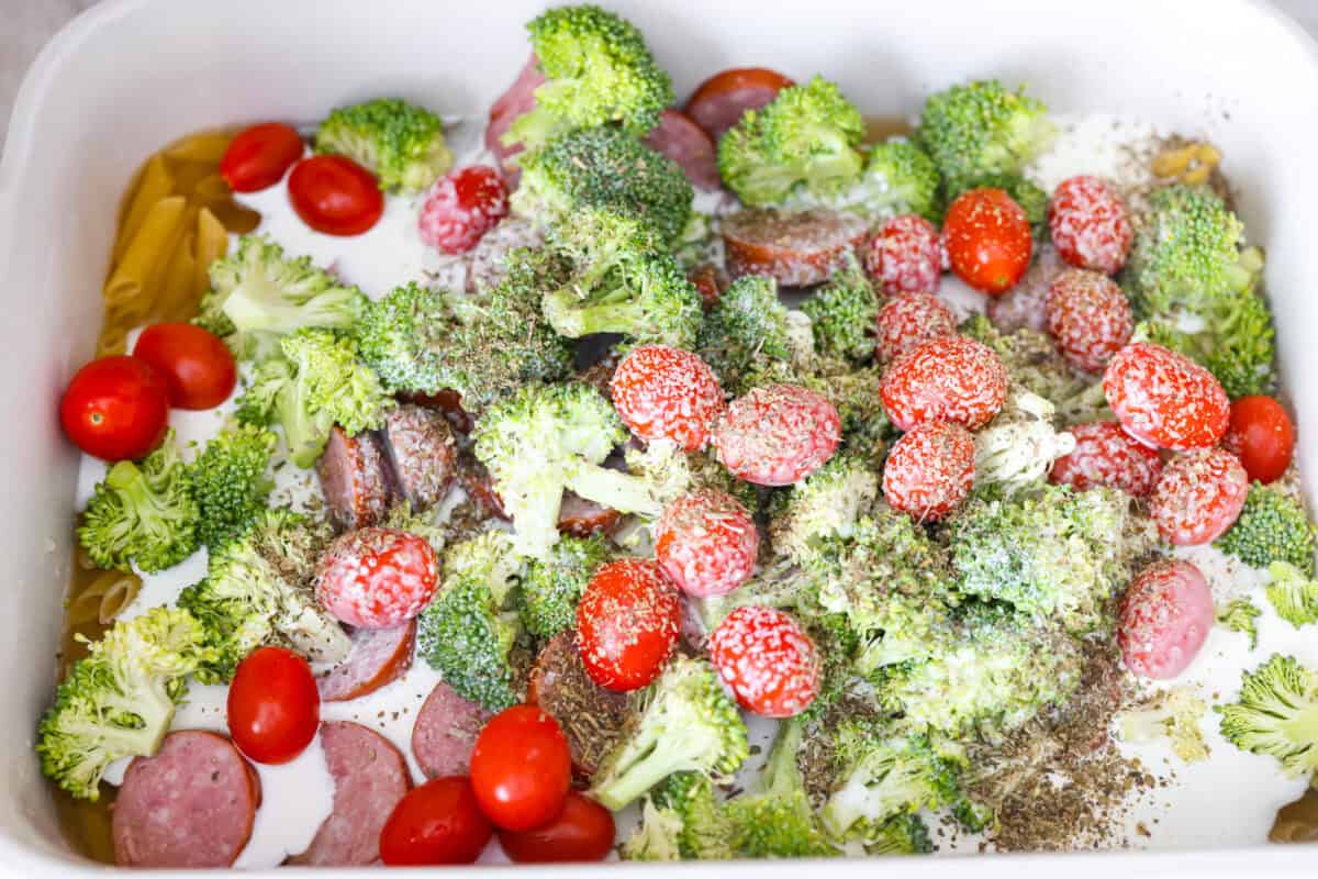 All ingredients and seasonings added to the baking dish. 